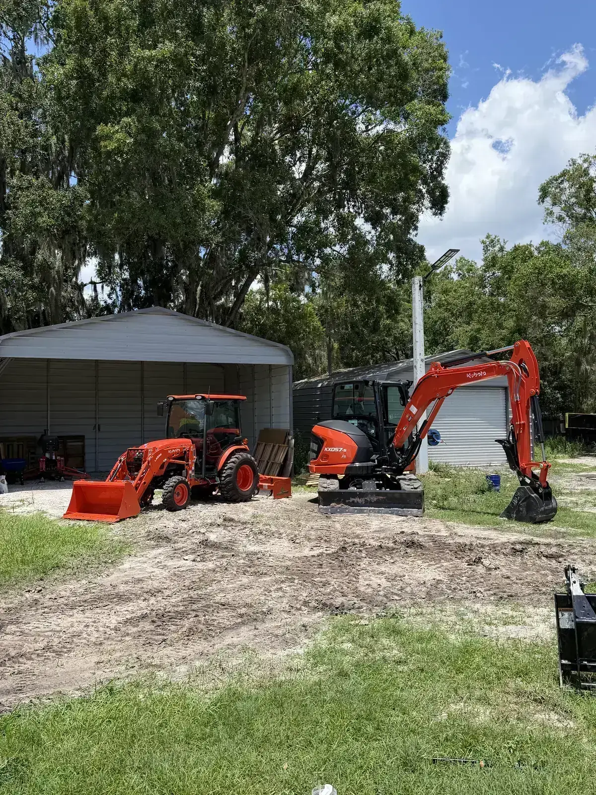 Kubota compact equipment used for land clearing and property cleanup